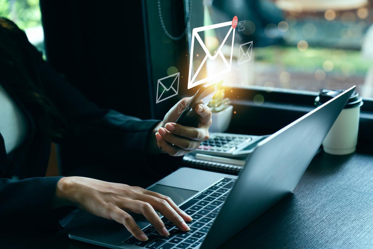 Women using computer to send messages