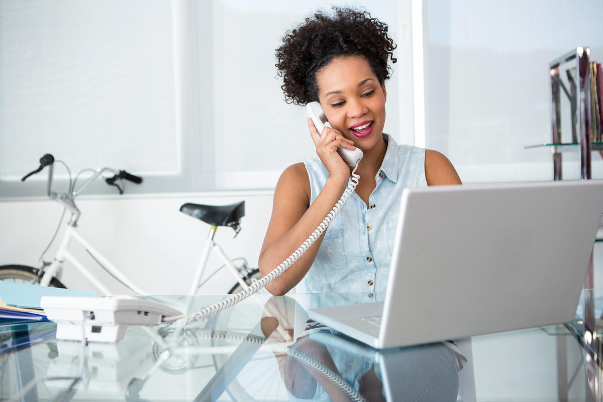 Woman working and talking on phone